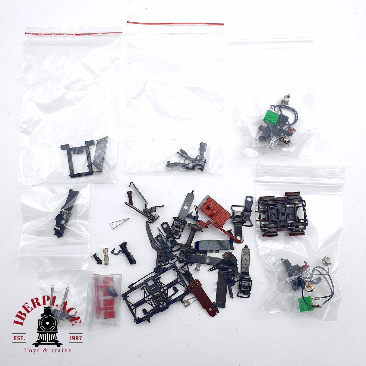 ♻️ 2da mano - Lote de repuestos bogies ruedas enganches H0 escala 1:87