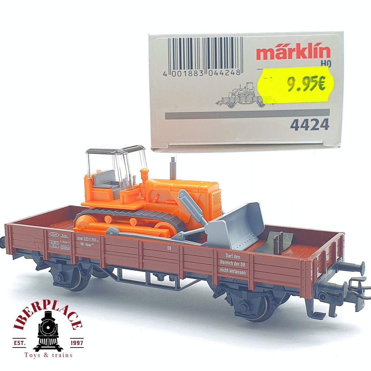 ♻️ 2 mano - Märklin 4424 vagón plataforma con pala cargadora DB H0 escala 1:87 TEN03