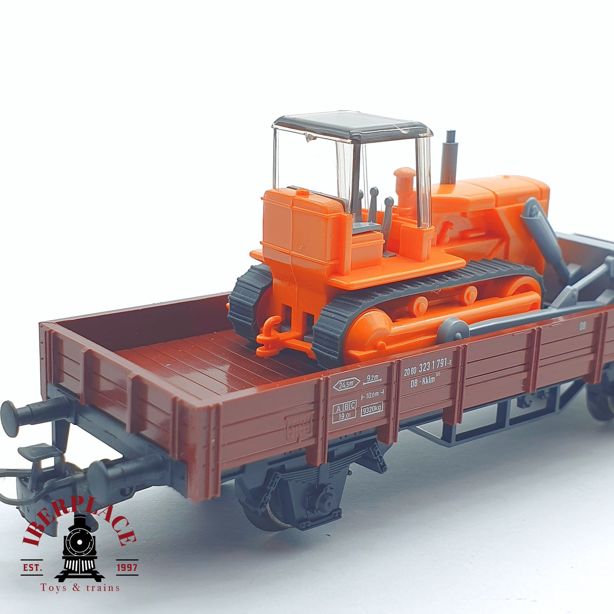 ♻️ 2 mano - Märklin 4424 vagón plataforma con pala cargadora DB H0 escala 1:87 TEN03